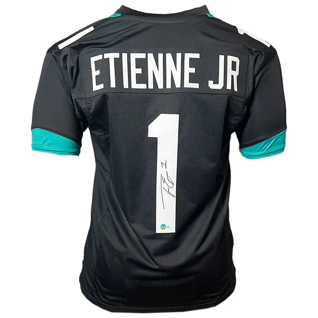 Travis Etienne Signed Jacksonville Black Football Jersey (Beckett)